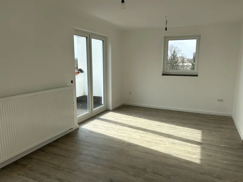 Lichtdurchflutetes Dachgeschoss: Moderne 2-Zimmer-Wohnung mit zwei Balkonen in Mariendorf — photo 1